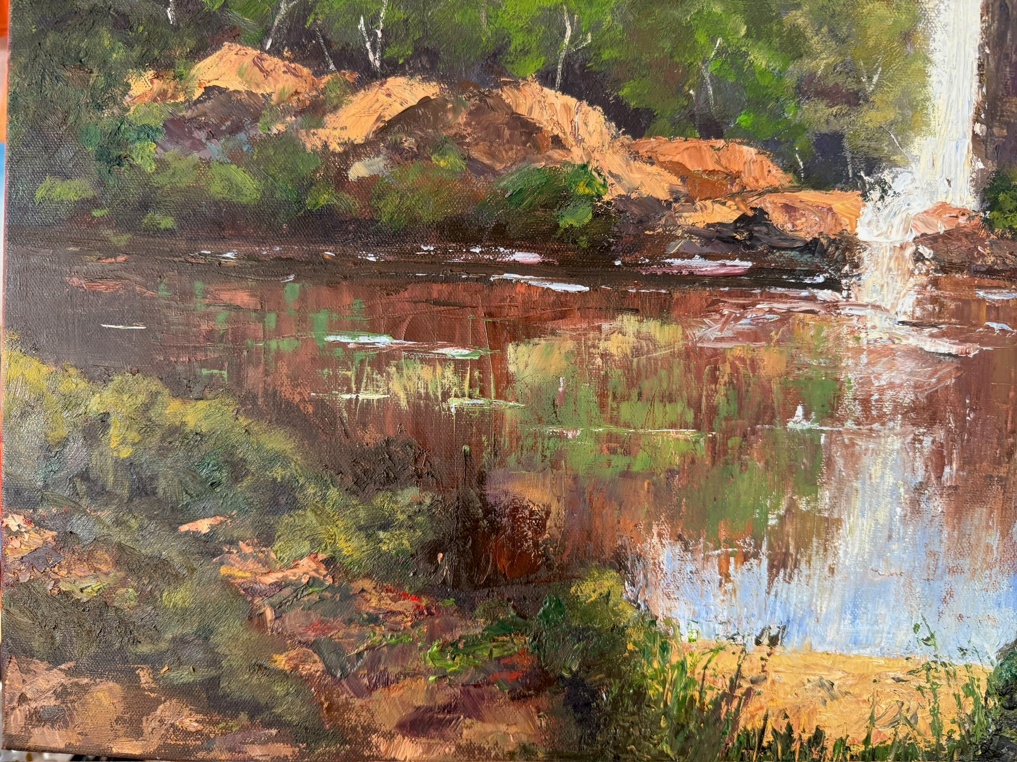 Waterfall over the cliffs, reflections in the water,  24X20