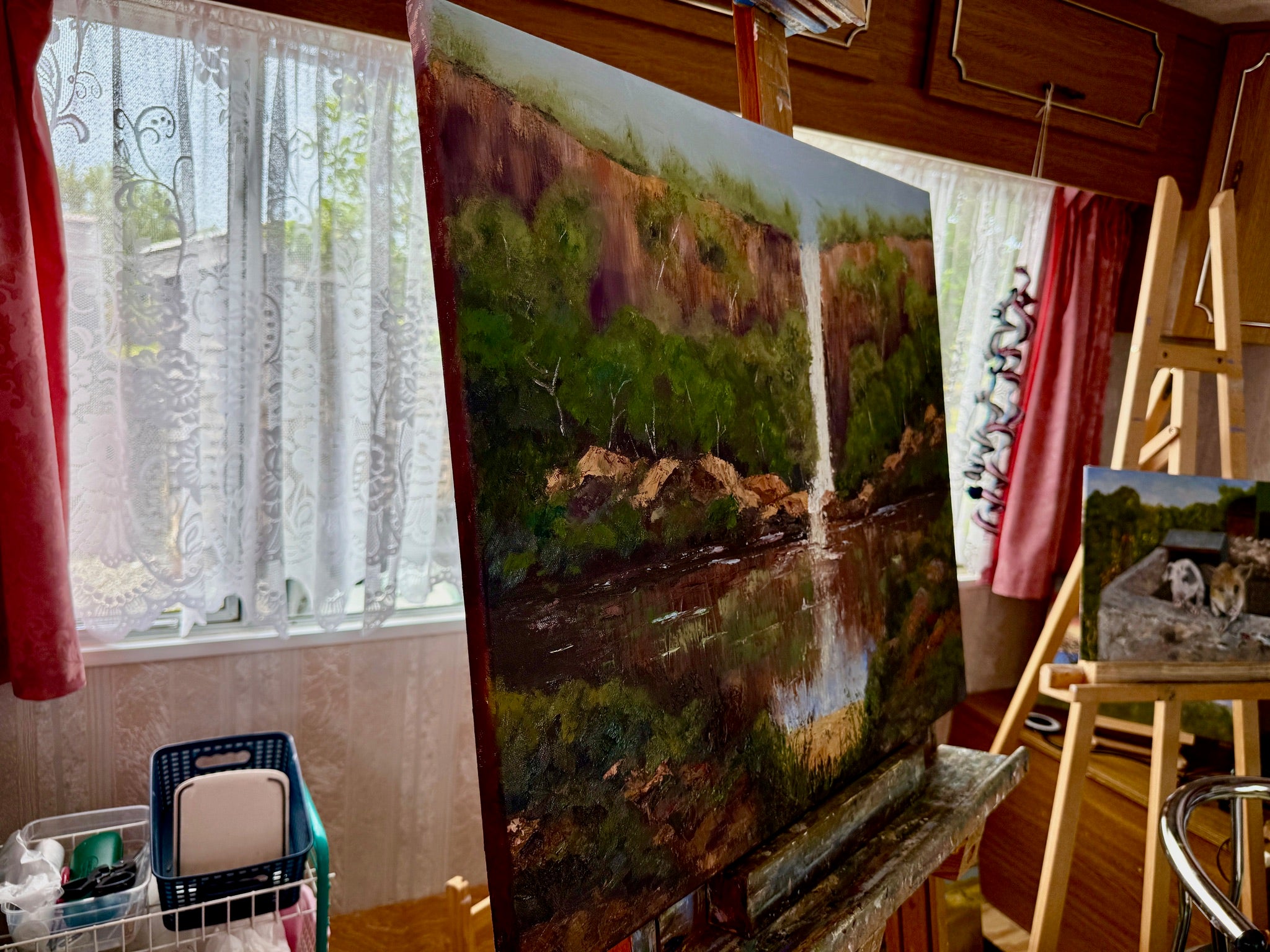 Waterfall over the cliffs, reflections in the water,  24X20