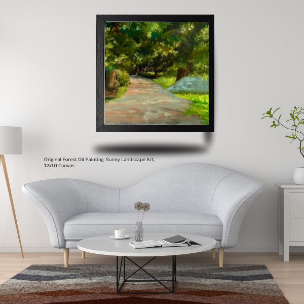 A framed oil painting of a sunny forest path is displayed on a white wall above a light gray sofa in a modern living room setting. The text on the left reads 'Original Forest Oil Painting: Sunny Landscape Art, 10x10 Canvas'.