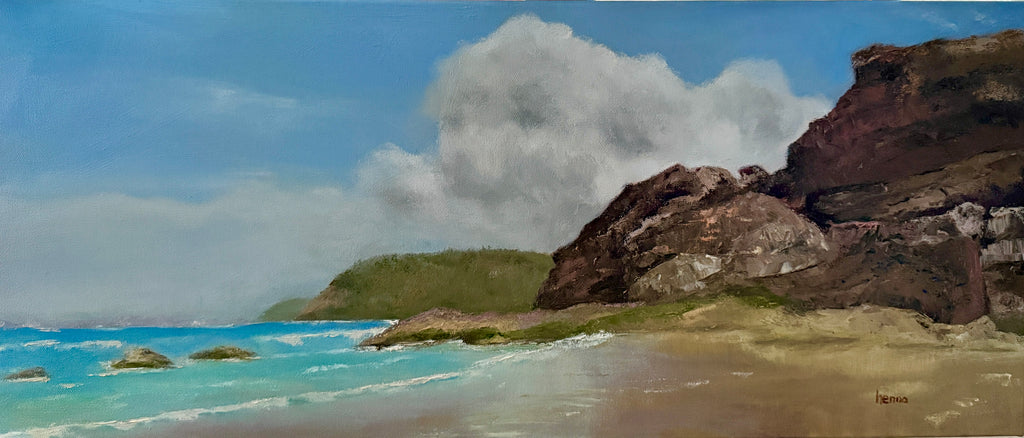 An oil painting of a coastal landscape featuring a sandy beach, turquoise ocean water, green hills, and large brown cliffs under a blue sky with a prominent white cloud.