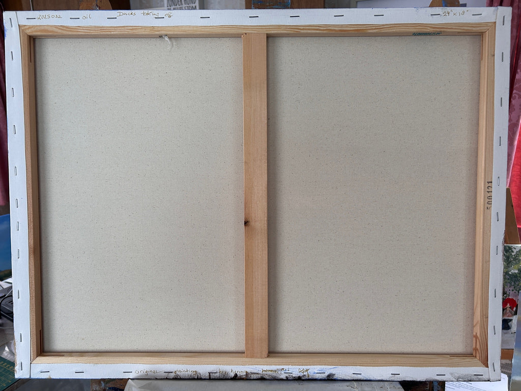 Wooden picture frame with two inner panels on a white background
