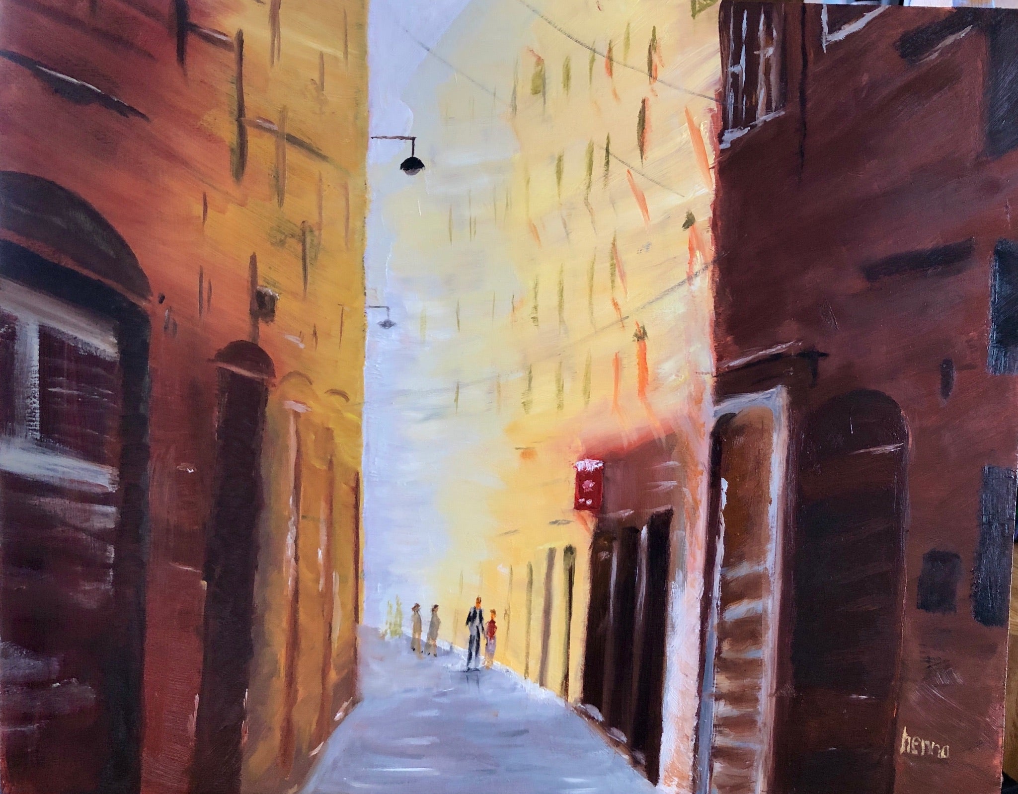 An impressionistic painting of a narrow European street flanked by warm ochre and terracotta buildings, with a pale sky in the distance and small figures walking down the center.